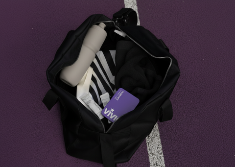 VIVID Recovery hangover support tin packed in a gym bag.